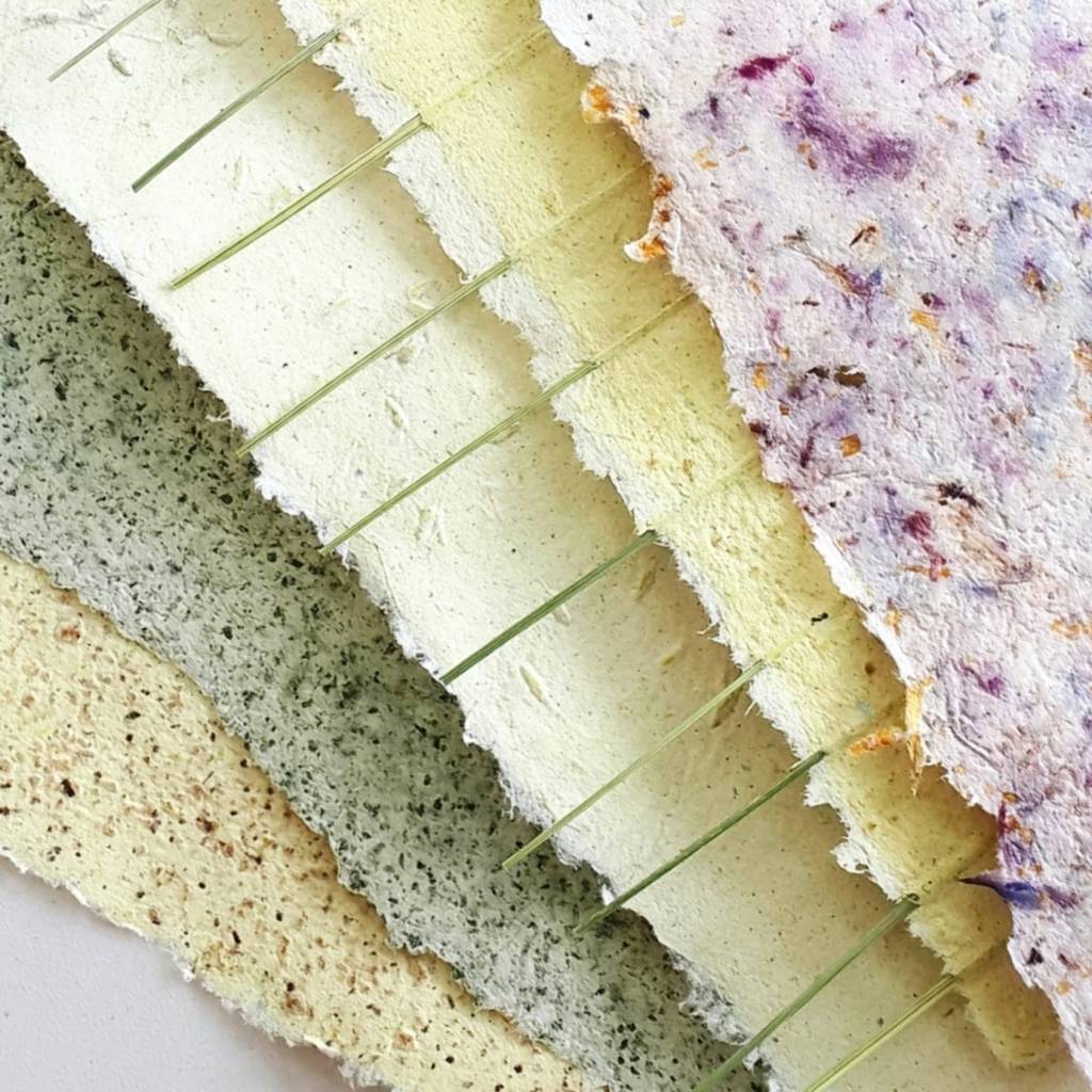 Pretty ice cream coloured handmade papers layered on top of one another